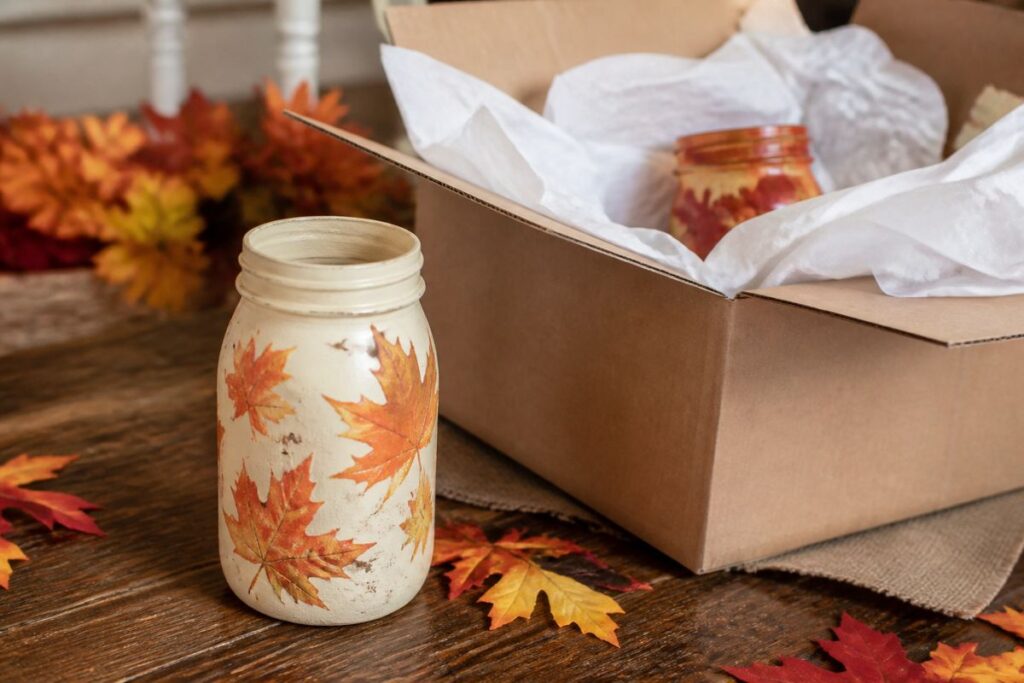 Painted seasonal glass jars wrapped for storage